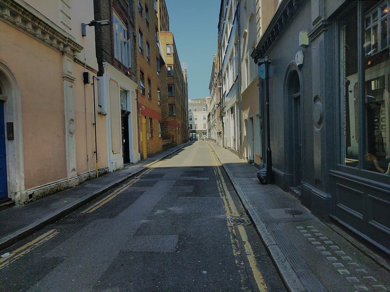 Gilbert Place in London with strong building shadows